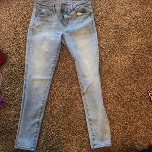 Light wash blue jeans.